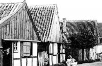 W-017-Asymetryczny helski dom rybacki z ozdobną koroną. Karta pocztowa z około 1910 roku.
